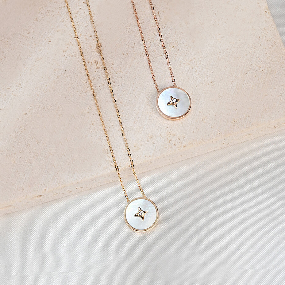 18K金及玫瑰金星芒母貝項鍊近拍照